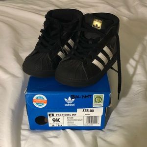 Little boys Adidas high top sneakers